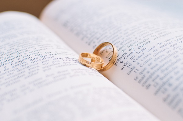 Two rings on the pages of a book