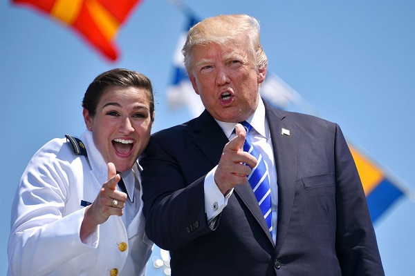 President Donald Trump and Coast Guard Ensign Erin Reynolds 